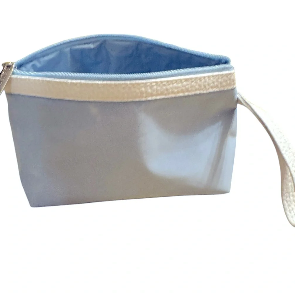 Borghese blue cosmetics bag w/travel size collection of skincare products. NEW